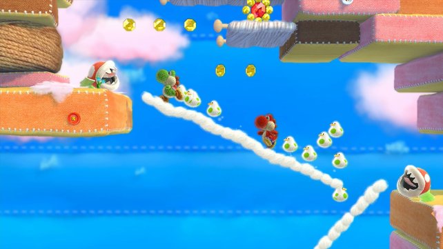 Zwei Spieler agieren am selben Bildschirm als grüner und roter Yoshi.